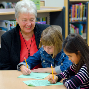 resident volunteering with children